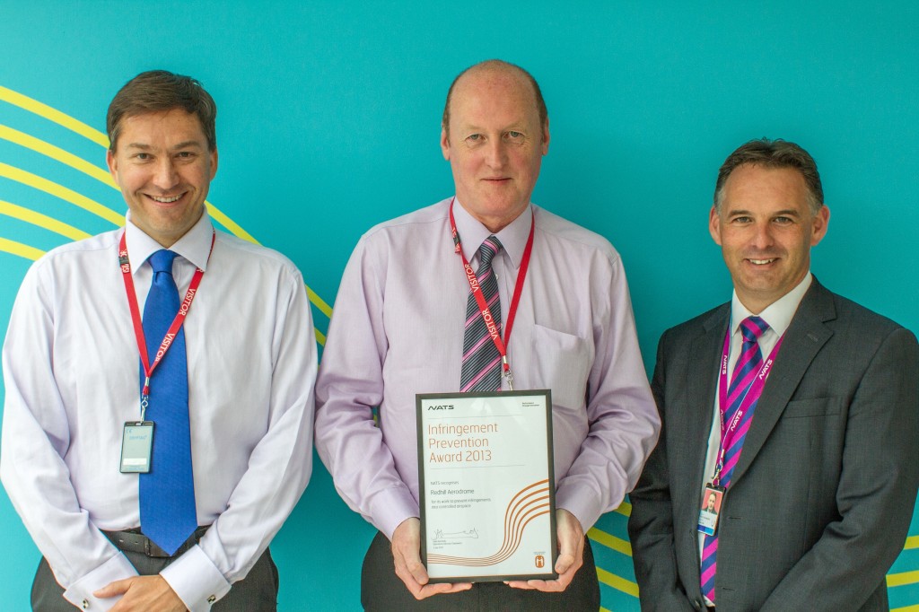 Fraser Hay, of Redhill Aerodrome and Phillip Wright, Aerodrome Manager, with Paul Haskins, NATS General Manager London Terminal Control